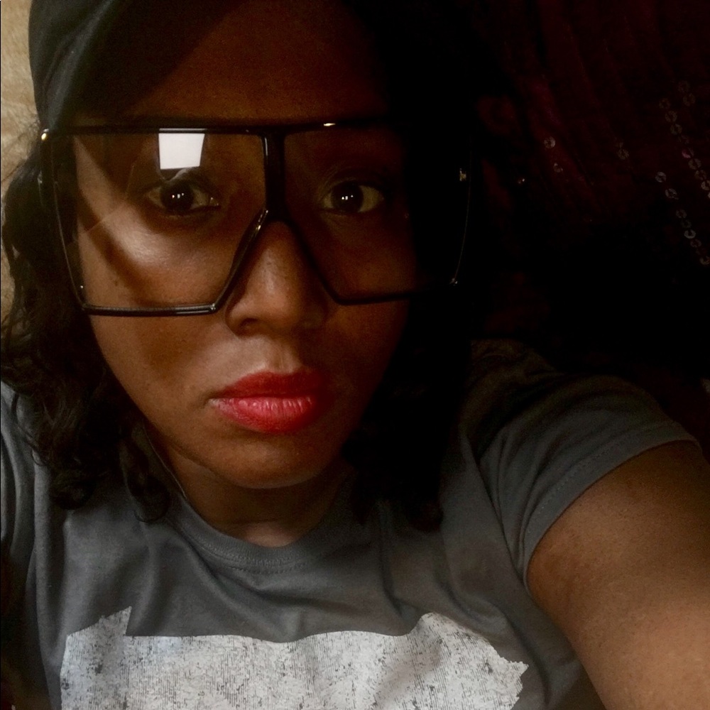 Black and clear lensed sunglasses